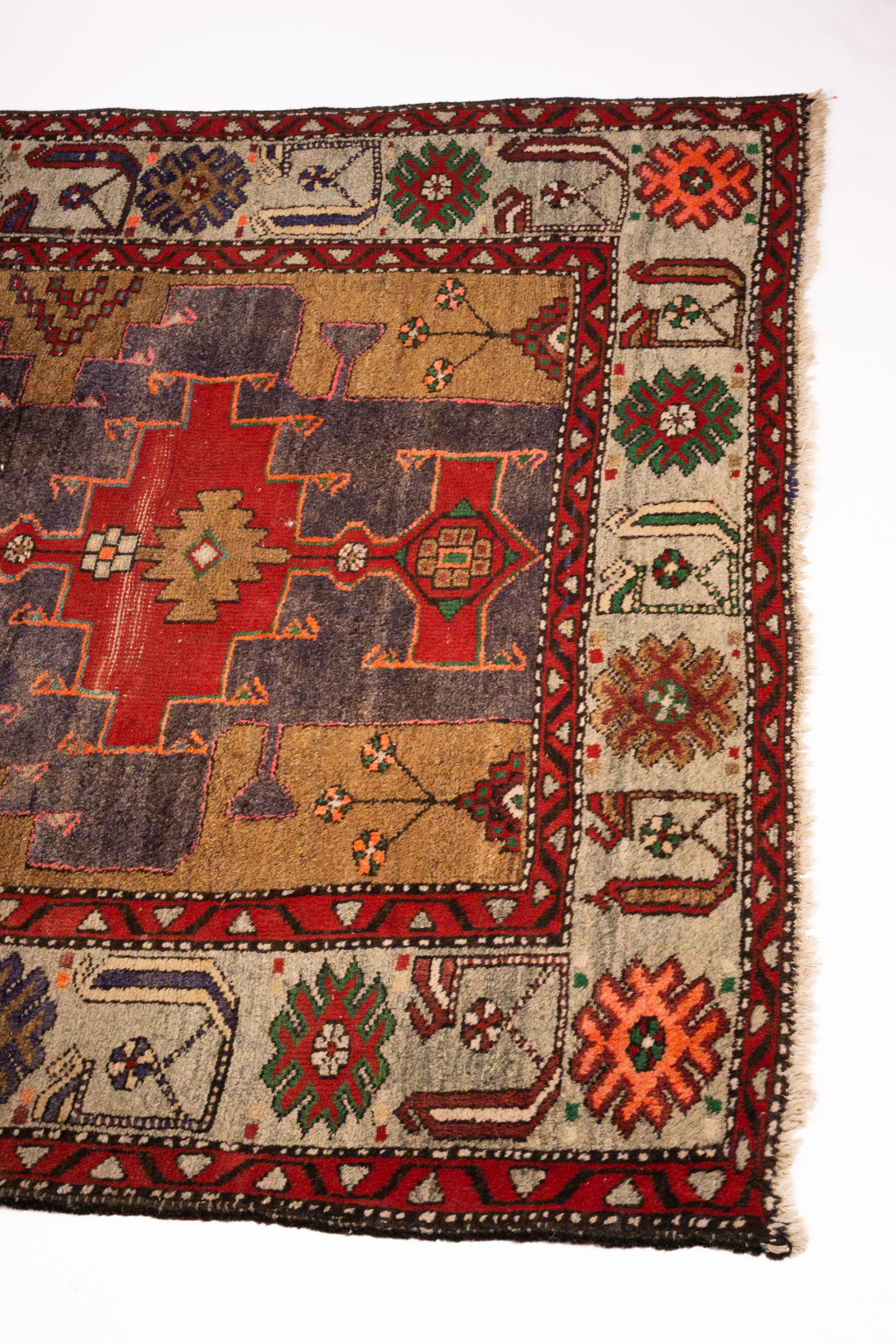 A Caucasian Kazak blue ground rug, 206 x 128cm